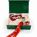 Personalised family Christmas gift kit with name sign, three scented candles and green premium gift box on white background