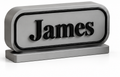 Personalised desk name plates in several colours with different names
