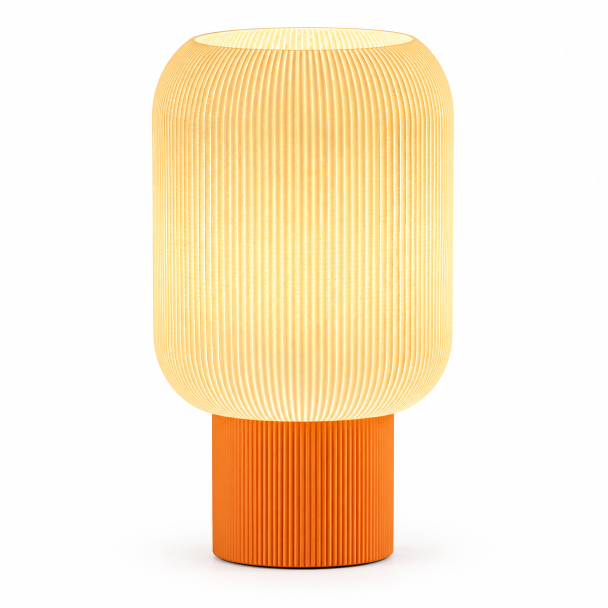 Modern table lamp with a rounded white ribbed shade and cylindrical orange base