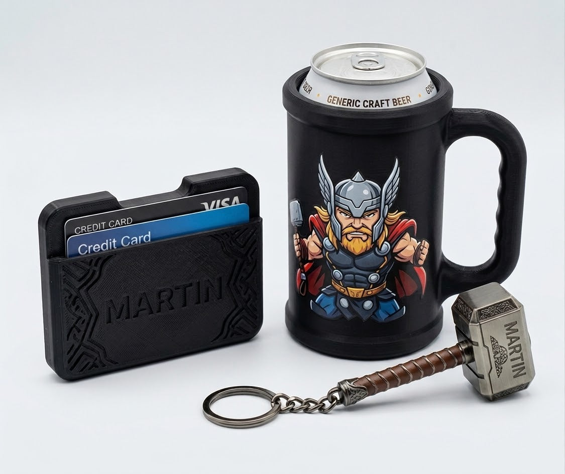 Personalised men's gift kit with Thor beer can mug, card holder and Mjolnir keychain on white background